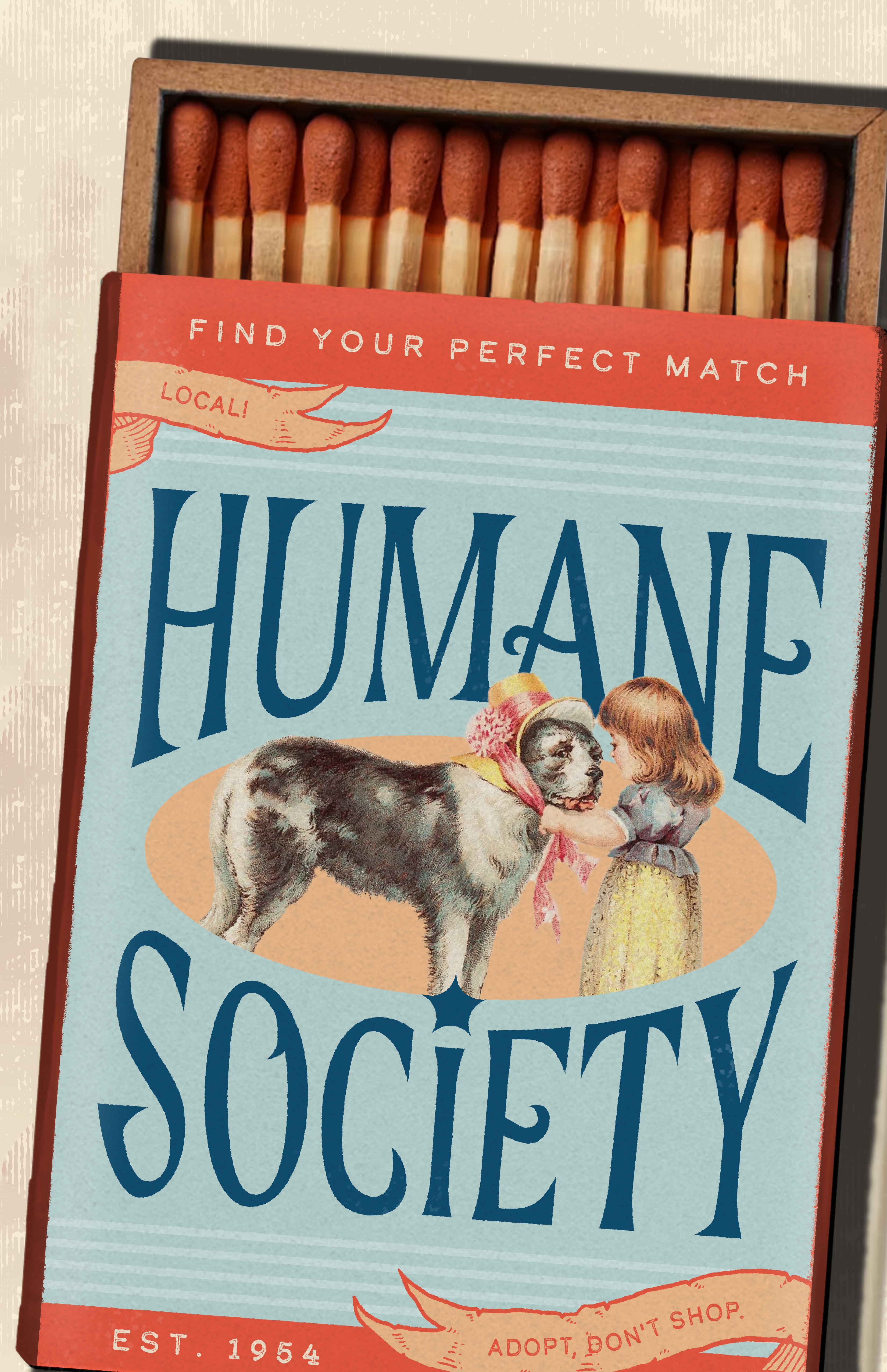 An angled match box with a vintage illustration of a girl and her dog, reading 'Humane Society' as the match brand. The phrase 'Find Your Perfect Match', is featured, with 'Local', and 'Adopt Dont Shop' written in banners in the corners and 'Est 1954' along the bottom.
